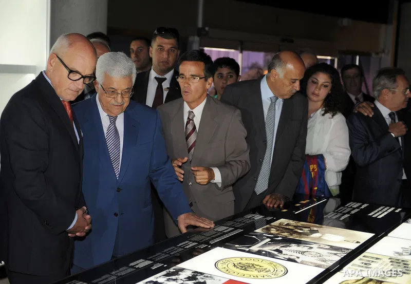 Palestinian president Mahmud Abbas meets with FC Barcelona's vice president Carles Vilarrubi during a visit at the Camp Nou Stadium in Barcelona on July 21, 2011. Abbas is on a two-day visit in Spain aimed at drumming up...