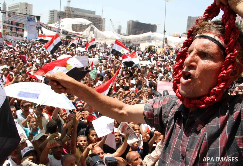 A protester holds a noose as he shouts revenge slogans after Friday prayers at Tahrir square in Cairo July 22, 2011. Egypt's prime minister promised on Thursday to set up an anti-corruption body and work to end a 30-year...