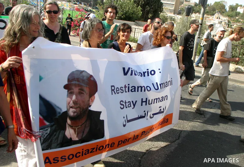 Palestinians, Israelis and foreign activists take part in a weekly demonstration in solidarity with the people of the Sheikh Jarrah neighbourhood who are being expelled from their homes in Jerusalem on July 22,2011. Phot...