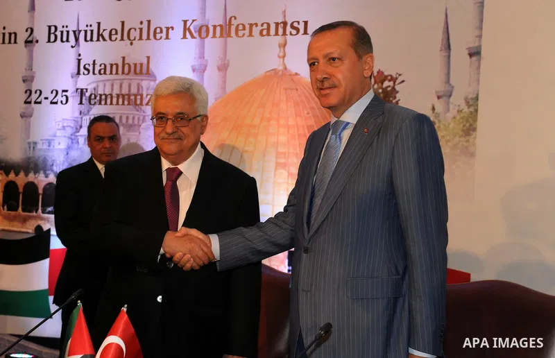 Palestinian President Mahmoud Abbas (Abu Mazen) shakes hands with Turkish Prime Minister Recep, Tayyip Erdogan during a meeting in Istanbul on July 23, 2011. Photo by Thaer Ganaim
