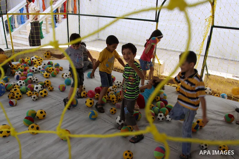 Palestinian children enjoy playing balls at Kindergarten in Gaza City on July 23, 2011. Photo by Mohammed Asad