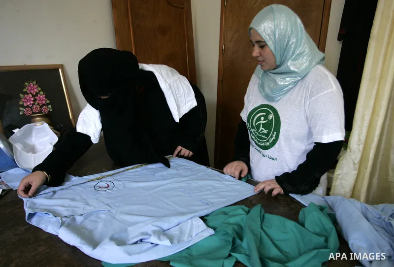 Palestinian women participate in a summer camp organised by the Ministry of Youth and Sports in the southern Gaza Strip town of Rafah on July 23,2011. Photo by Abed Rahim Khatib