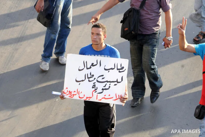 Egyptian protesters march towards the defence ministry, the headquarters of the Supreme Council of the Armed Forces, in Cairo on July 23, 2011 to show their anger at the ruling military's handling of the transition from...