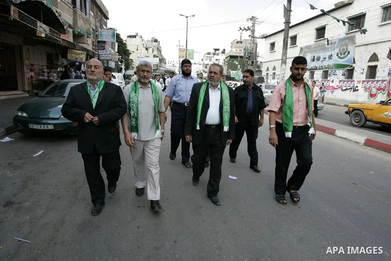 Palestinian Hamas officials congratulates the successful students in the secondary school in Gaza city on July 24, 2011. The Ministry of Education in Gaza Strip and the West Bank announced the results together. Photo by...