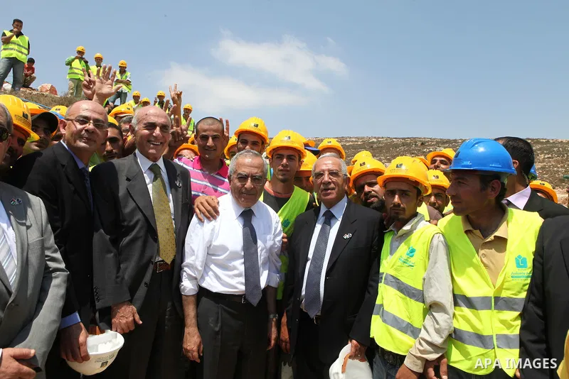 Palestinian Prime Minister, Salam Fayyad lays the cornerstone for al-Ghadeer housing area in the West Bank city of Ramallah on July 24, 2011. Photo by Mustafa Abu Dayeh