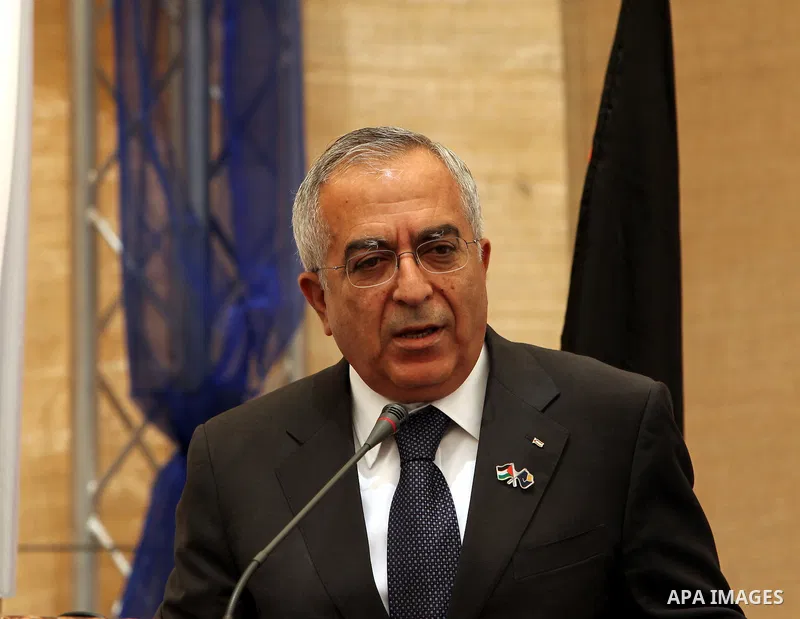 Palestinian Prime Minister, Salam Fayyad lays the cornerstone for al-Ghadeer housing area in the West Bank city of Ramallah on July 24, 2011. Photo by Mustafa Abu Dayeh