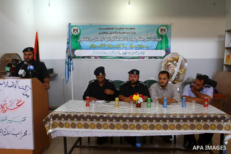 Palestinian Hamas police delivers speech during released prisoners from a Hamas-run jail in Gaza City on July 25, 2011. Palestinian Hamas police released prisoners because of the approaching holy month of Ramada. Photo b...