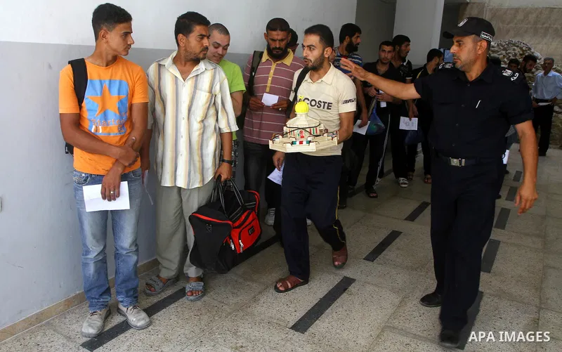Palestinian prisoners prepare to be freed from a Hamas-run jail in Gaza City on July 25, 2011. Palestinian Hamas police released prisoners because of the approaching holy month of Ramadan. Photo by Ashraf Amra