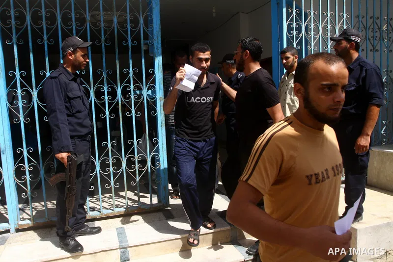 Palestinian prisoners prepare to be freed from a Hamas-run jail in Gaza City on July 25, 2011. Palestinian Hamas police released prisoners because of the approaching holy month of Ramadan. Photo by Ashraf Amra