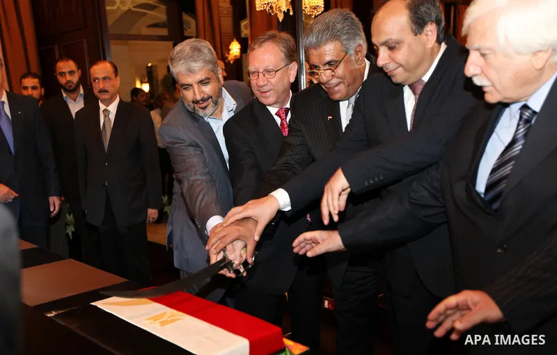 Palestinian Chairman of the political bureau of Hamas, Khaled Meshaal visits the Egyptian Embassy on the occasion of the anniversary of the July 23 Revolution in Cairo on July 25, 2011. Photo by Majd Majd