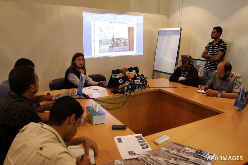 Representative of the Jerusalem office of the European Union speaks at a press conference about the achievements of the Union in the office of Gaza city on July 25, 2011. Photo by Mohammed Asad