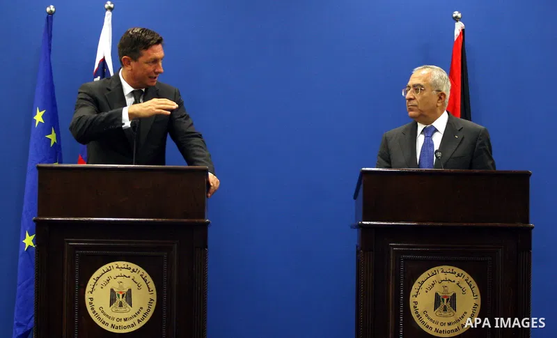Palestinian Prime Minister, Salam Fayyad and Slovenia's Prime Minister Borut Pahor (L) give a joint press conference in the West Bank city of Ramallah on July 27, 2011. Photo by Issam Rimawi