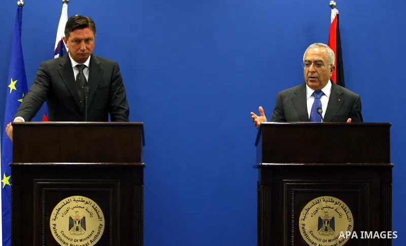 Palestinian Prime Minister, Salam Fayyad and Slovenia's Prime Minister Borut Pahor (L) give a joint press conference in the West Bank city of Ramallah on July 27, 2011. Photo by Issam Rimawi