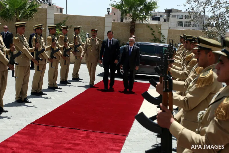 Palestinian Prime Minister, Salam Fayyad during a meeting with Slovenia's Prime Minister, Borut Pahor (L) in the West Bank city of Ramallah on July 27, 2011. Photo by Issam Rimawi