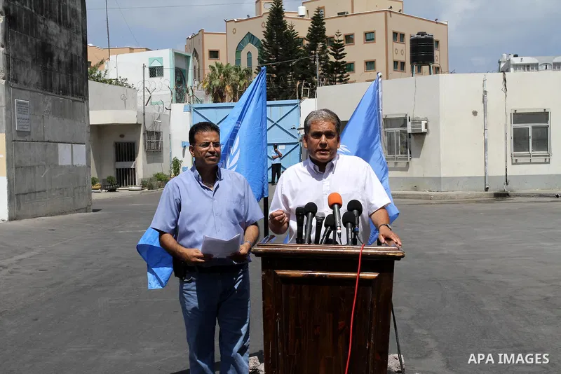 The UNRWA Spokesman, Chris Guinness delivers speech during a press conference against targeted the summer games in Gaza city on July 28, 2011. Photo by Mohammed Asad