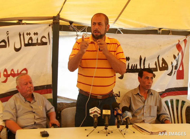 Palestinians take part in the press conference against the settlements, terrorism and the arrest of Palestinian children in the solidarity tent in silwan in Jerusalem on July 28, 2011. Photo by Mahfouz Abu Turk
