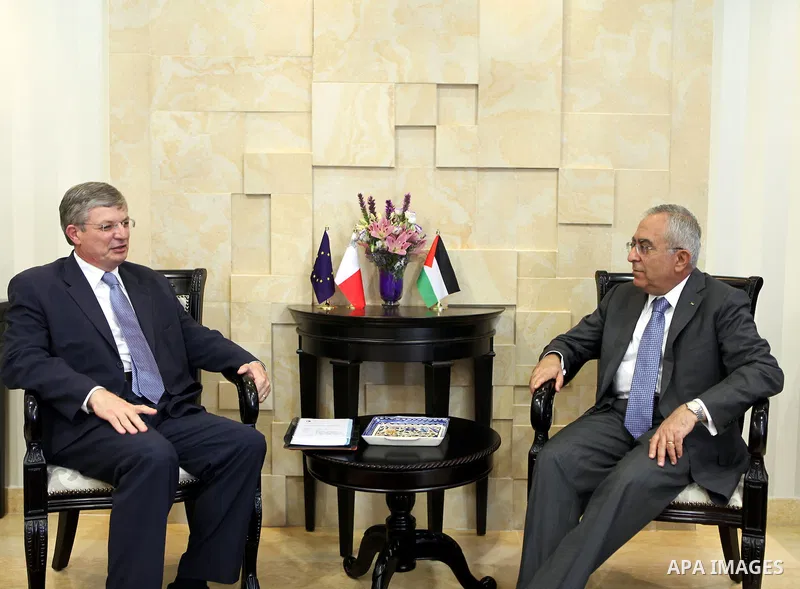 Palestinian Prime Minister, Salam Fayyad receives Foreign Minister of Malta, Tonio Borg in the West Bank city of Ramallah on July 2, 2011. Photo by Mustafa Abu Dayeh