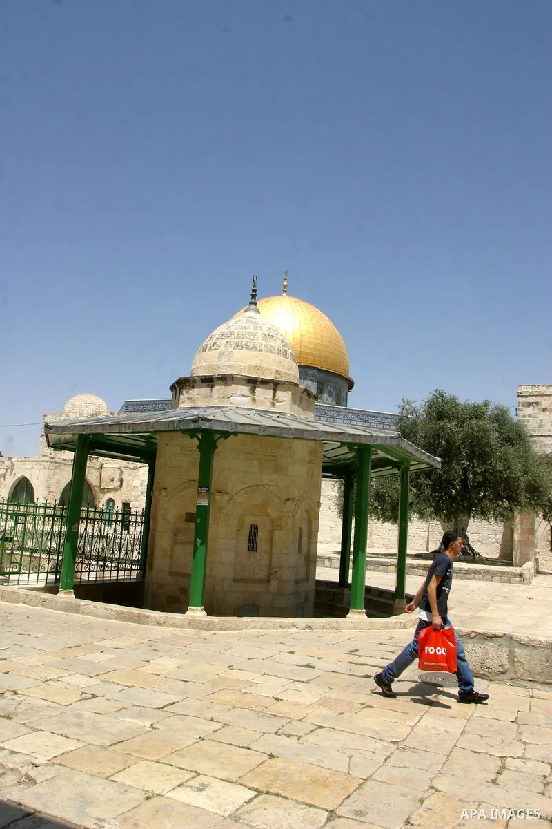 A Palestinian Muslim walks in the yards of al Aqsa Mosque, after al-dohor prayer in the old city of jerusalem in July 27, 2011. Photo by Mahfouz Abu Turk