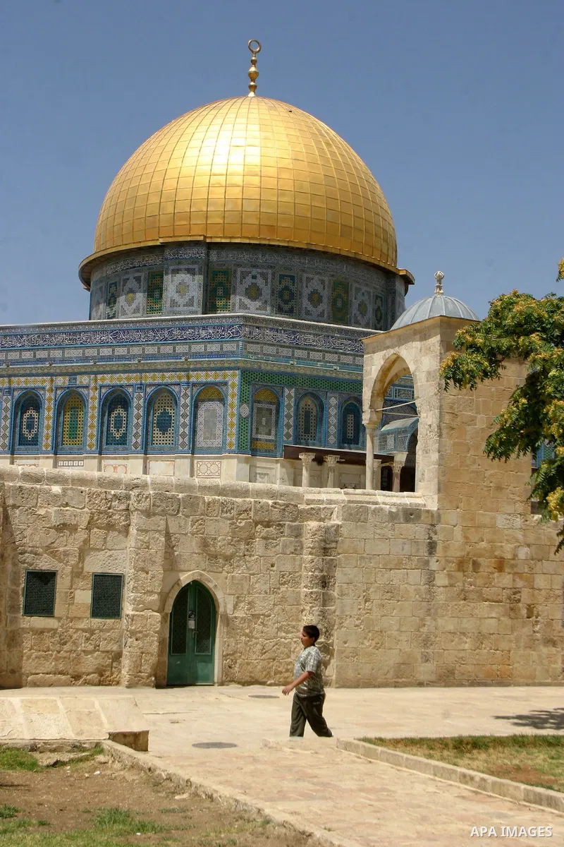 A Palestinian Muslim walks in the yards of al Aqsa Mosque, after al-dohor prayer in the old city of jerusalem in July 27, 2011. Photo by Mahfouz Abu Turk