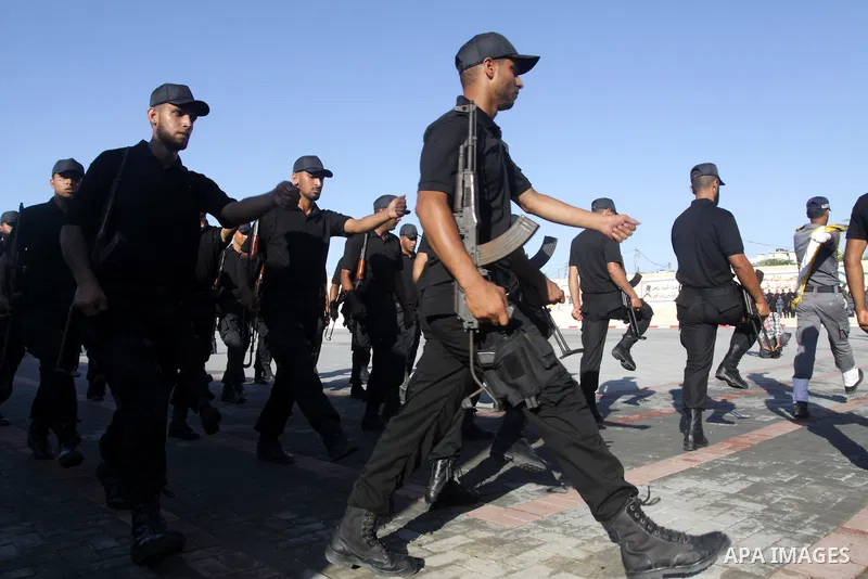 Palestinian Hamas security forces march during a graduation ceremony at the Ansar police compound in Gaza City on July 28, 2011. Photo by Naaman Omar