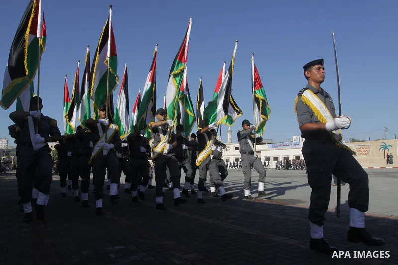 Palestinian Hamas security forces march during a graduation ceremony at the Ansar police compound in Gaza City on July 28, 2011. Photo by Naaman Omar
