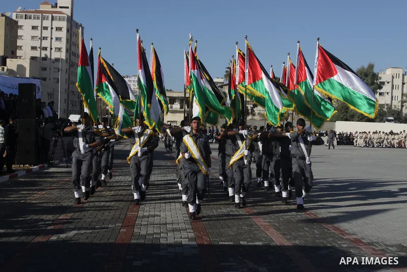 Palestinian Hamas security forces march during a graduation ceremony at the Ansar police compound in Gaza City on July 28, 2011. Photo by Naaman Omar