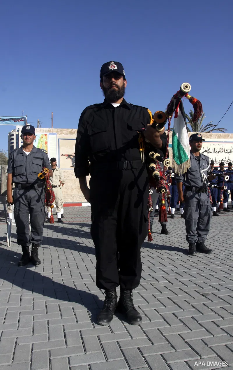 Palestinian Hamas security forces march during a graduation ceremony at the Ansar police compound in Gaza City on July 28, 2011. Photo by Naaman Omar