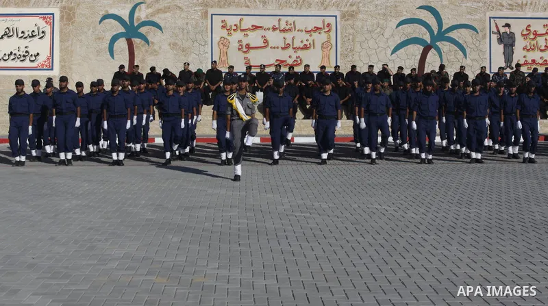 Palestinian Hamas security forces march during a graduation ceremony at the Ansar police compound in Gaza City on July 28, 2011. Photo by Naaman Omar
