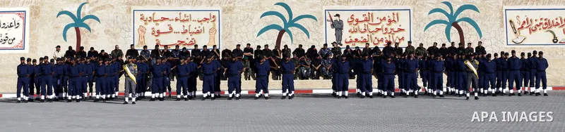 Palestinian Hamas security forces march during a graduation ceremony at the Ansar police compound in Gaza City on July 28, 2011. Photo by Naaman Omar