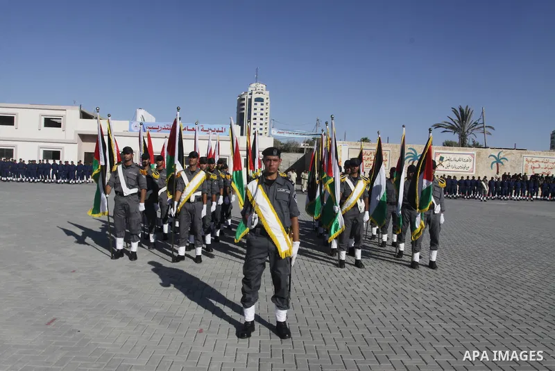 Palestinian Hamas security forces march during a graduation ceremony at the Ansar police compound in Gaza City on July 28, 2011. Photo by Naaman Omar