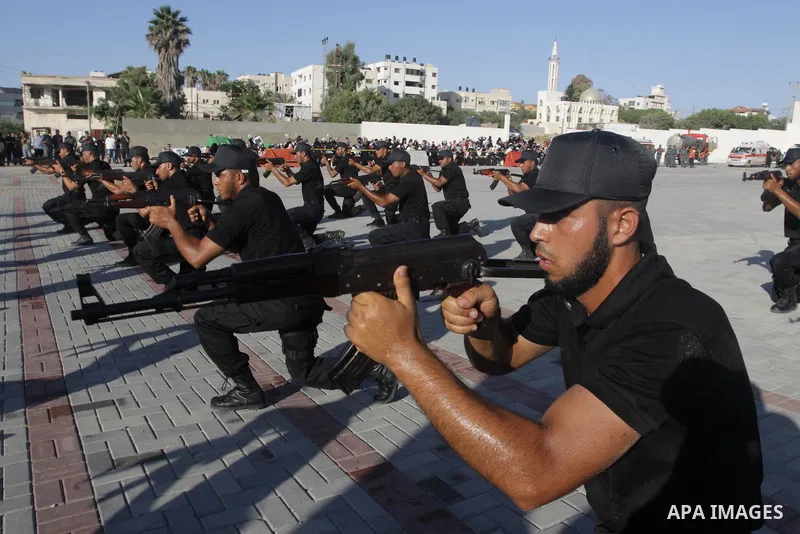 Palestinian Hamas security forces show their skills during a graduation ceremony at the Arafat police compound in Gaza City on July 28, 2011. Photo by Naaman Omar