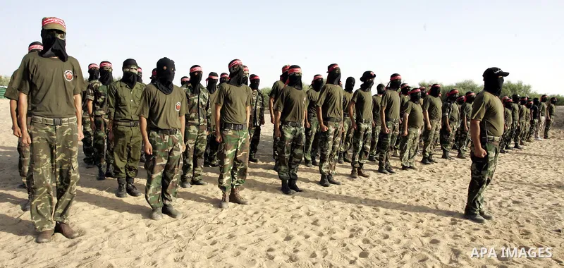 Militants of the Democratic Front for Liberation Palestine (DFLP) train during a military graduation ceremony in Rafah, southern Gaza Strip, on July 29, 2011. Photo by Abed Rahim Khatib