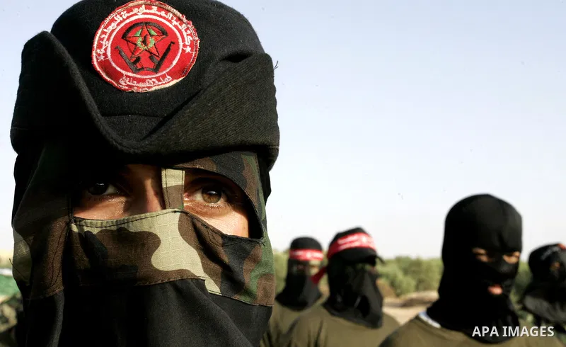 Militants of the Democratic Front for Liberation Palestine (DFLP) train during a military graduation ceremony in Rafah, southern Gaza Strip, on July 29, 2011. Photo by Abed Rahim Khatib