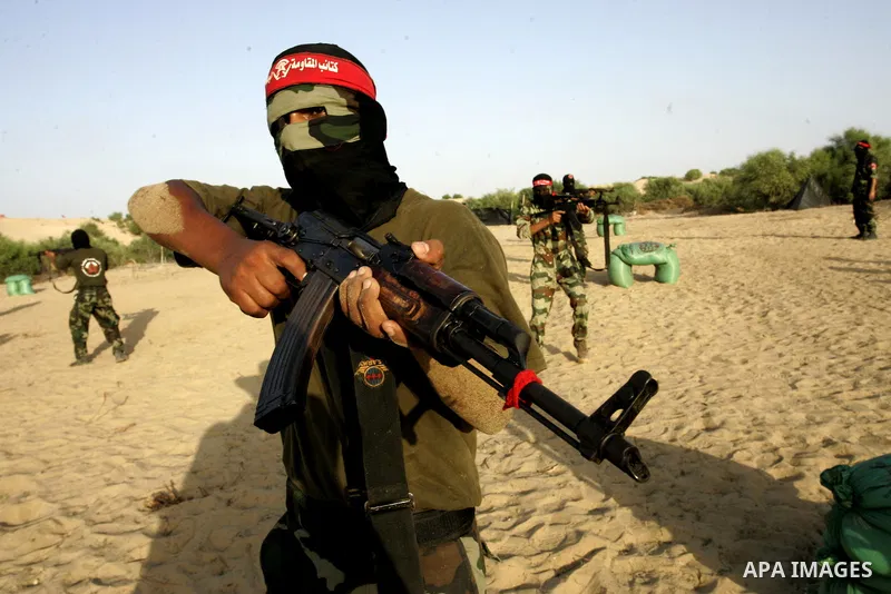 Militants of the Democratic Front for Liberation Palestine (DFLP) train during a military graduation ceremony in Rafah, southern Gaza Strip, on July 29, 2011. Photo by Abed Rahim Khatib