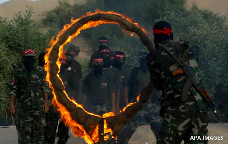 Militants of the Democratic Front for Liberation Palestine (DFLP) train during a military graduation ceremony in Rafah, southern Gaza Strip, on July 29, 2011. Photo by Abed Rahim Khatib