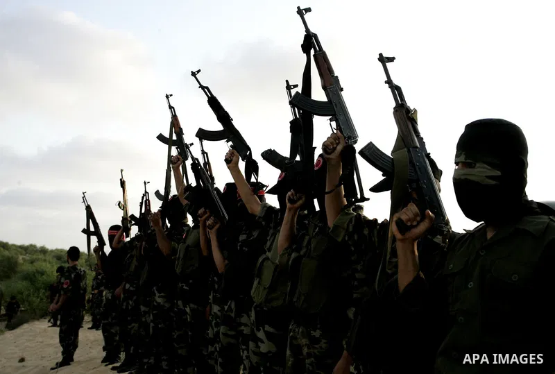 Militants of the Democratic Front for Liberation Palestine (DFLP) train during a military graduation ceremony in Rafah, southern Gaza Strip, on July 29, 2011. Photo by Abed Rahim Khatib