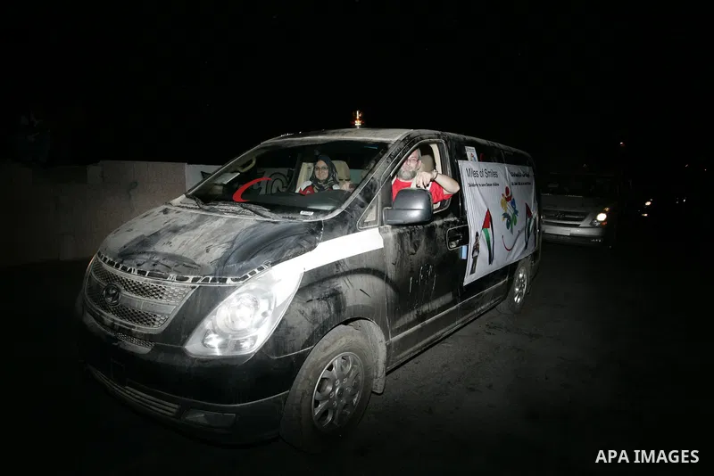 A convoy of "Miles of Smiles 4" carrying medical aid to Gaza crosses the Rafah crossing into the southern Gaza Strip from Egypt on July 31, 2011. Photo by Abed Rahim Khatib