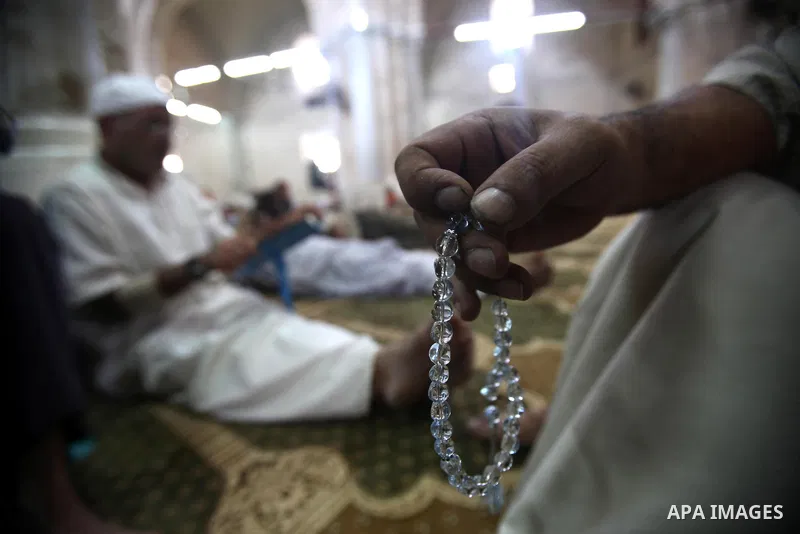 A Palestinian man holds rosary on the first day of holy fasting month of Ramadan at al-Omari mosque in Gaza city on Aug. 1, 2011. Throughout the holy month of Ramadan devout Muslims must abstain from food, drink and sex...