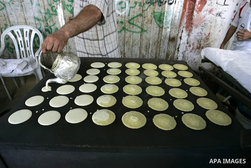 A Palestinian makes (Velours) on the first day of holy fasting month of Ramadan in the town of Rafah, southern Gaza Strip on Aug. 1, 2011. Throughout the holy month of Ramadan devout Muslims must abstain from food, drink...