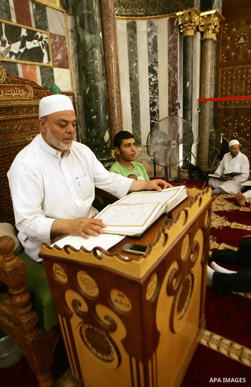 A Palestinian man reads the holy koran on the first day of holy fasting month of Ramadan in Jerusalem on Aug 1, 2011. Throughout the holy month of Ramadan devout Muslims must abstain from food, drink and sex from dawn un...