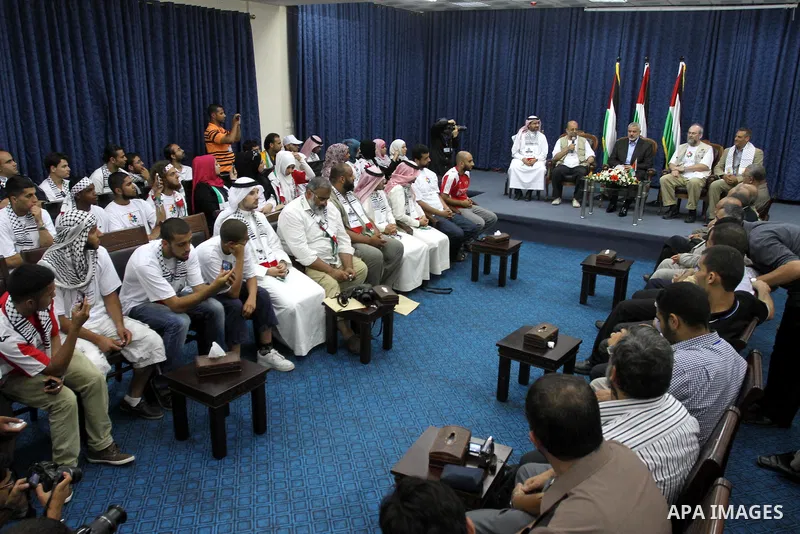 Palestinian Prime Minister in Gaza strip, Ismail Haniya during a meeting with members of the aid convoy 'Miles of Smiles 4' in Gaza city on Aug. 1, 2011 . The convoy, including 35 activists from Spain, the UK and Bahrain...