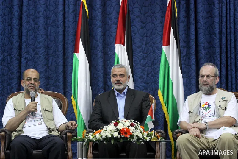 Palestinian Prime Minister in Gaza strip, Ismail Haniya during a meeting with members of the aid convoy 'Miles of Smiles 4' in Gaza city on Aug. 1, 2011 . The convoy, including 35 activists from Spain, the UK and Bahrain...