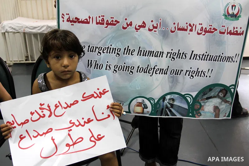 Palestinian Thalassemia patients, take part in a protest for the lack of medicine at Al-Rantisi hospital for the children, in Gaza city on Aug. 3, 2011, demanding for the introduction of medicines. Photo by Mohammed Asad