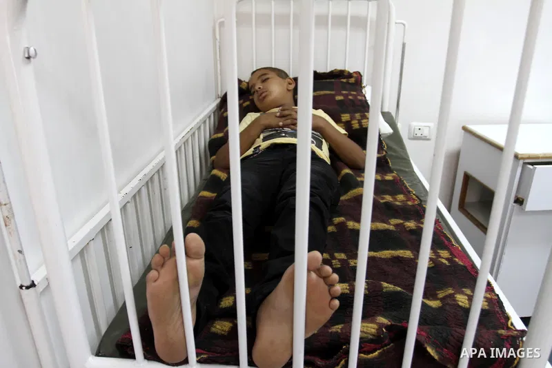 A Palestinian Thalassemia patient recieves treated, during a protest for the lack of medicine at Al-Rantisi hospital for the children, in Gaza city on Aug. 3, 2011, demanding for the introduction of medicines. Photo by M...