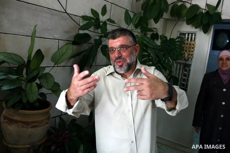 A Palestinian commander of the Hamas Islamist movement, Sheikh Hassan Yusef, 56, explain his story in israeli jails in the West Bank city of Ramallah after he was released from an Israeli jails, on Aug. 4, 2011. as Israe...