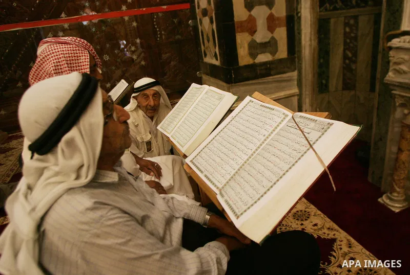 A Palestinian man reads the holy koran on the first day of holy fasting month of Ramadan in Jerusalem. Throughout the holy month of Ramadan devout Muslims must abstain from food, drink and sex from dawn until sunset when...