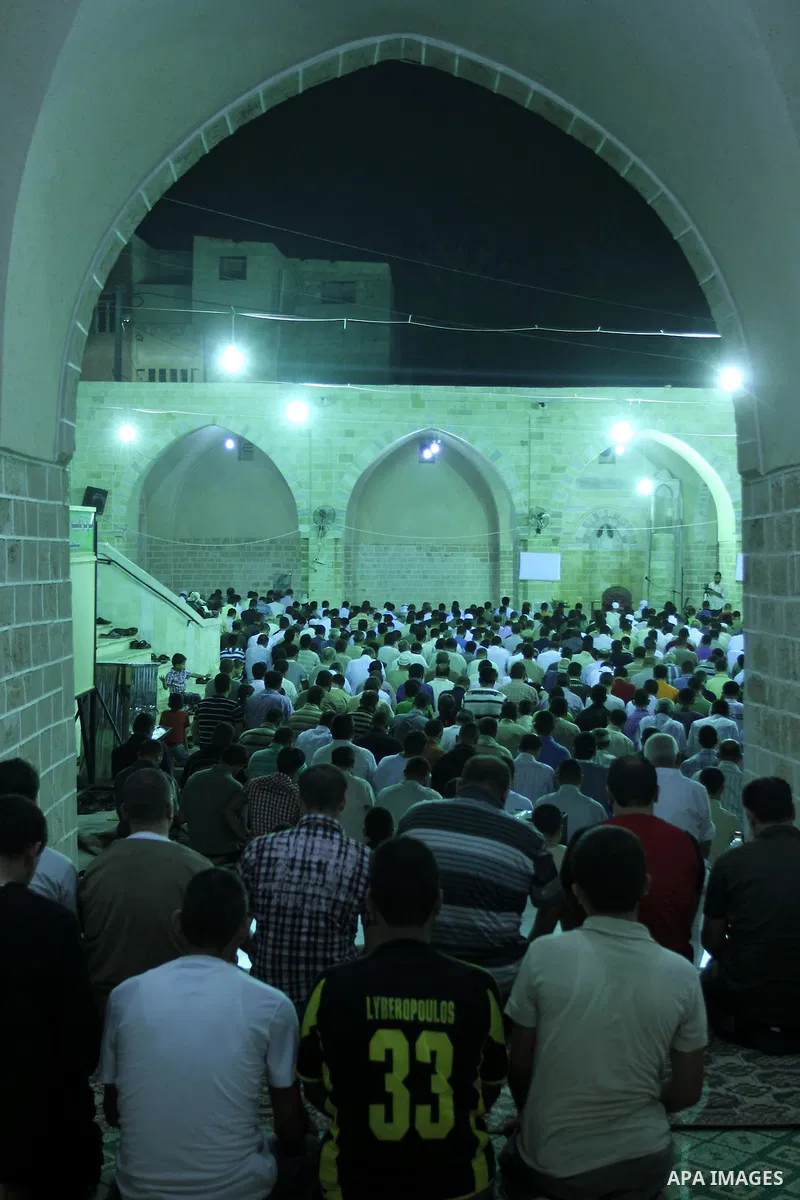 Palestinian Muslims pray al-Taraweeh prayer at al-Omari Mosque during the first Friday of the holy month of Ramadan in Gaza city on Aug. 5, 2011. Photo by Mohammed Asad