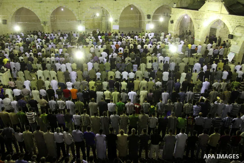 Palestinian Muslims pray al-Taraweeh prayer at al-Omari Mosque during the first Friday of the holy month of Ramadan in Gaza city on Aug. 5, 2011. Photo by Mohammed Asad