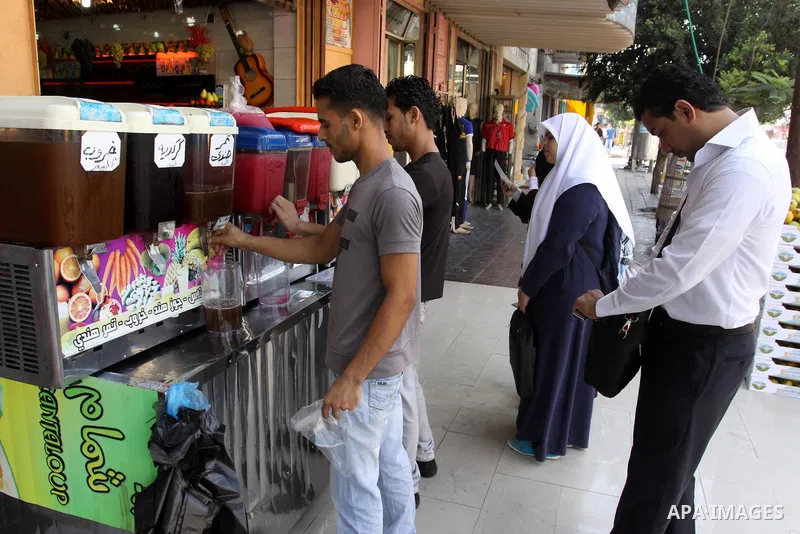 Palestinian vendor prepares different types of juice at his shop on the sixth day of the holy month of Ramadan in Gaza City on Aug. 6, 2011 . Muslims all over the world fast from dawn to dusk during the holy month of Ram...