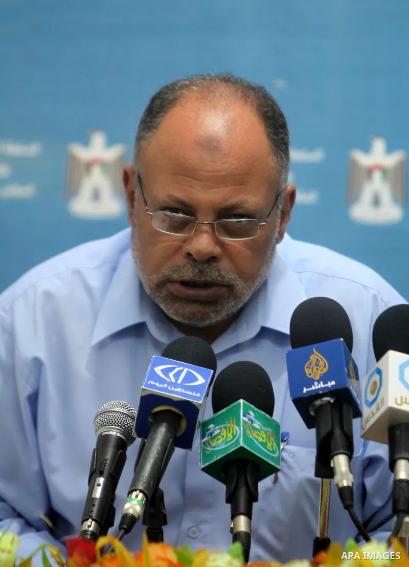 Palestinian Undersecretary of the Ministry of Finance , Ismail Mahfouz deliver speech in a press conference in Gaza city on Aug. 7, 2011, said that the ministry will pay the salaries of last July before Eid al-Fitr, and...